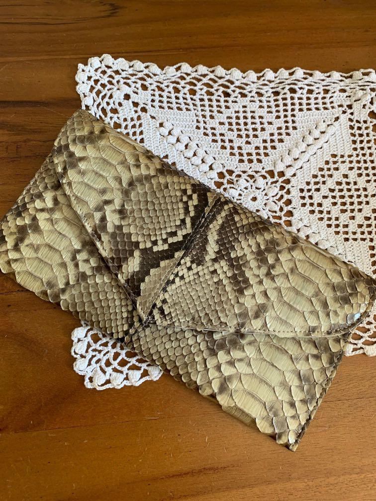Python Skin Envelop Wallets (Category: Bags & Wallets) located in Singapore. Submitted by amethyst71 (Listing ID 1119027068, Image 2). Description: Envelopes Model, 1 slot for card A bit defect on the liner, outside skin still Perfect. Can use for coctail or dinner dates 😆🥂.