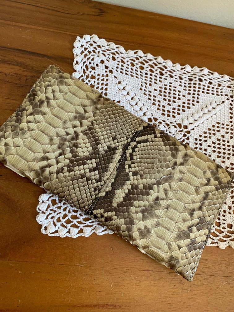 Python Skin Envelop Wallets (Category: Bags & Wallets) located in Singapore. Submitted by amethyst71 (Listing ID 1119027068, Image 3). Description: Envelopes Model, 1 slot for card A bit defect on the liner, outside skin still Perfect. Can use for coctail or dinner dates 😆🥂.