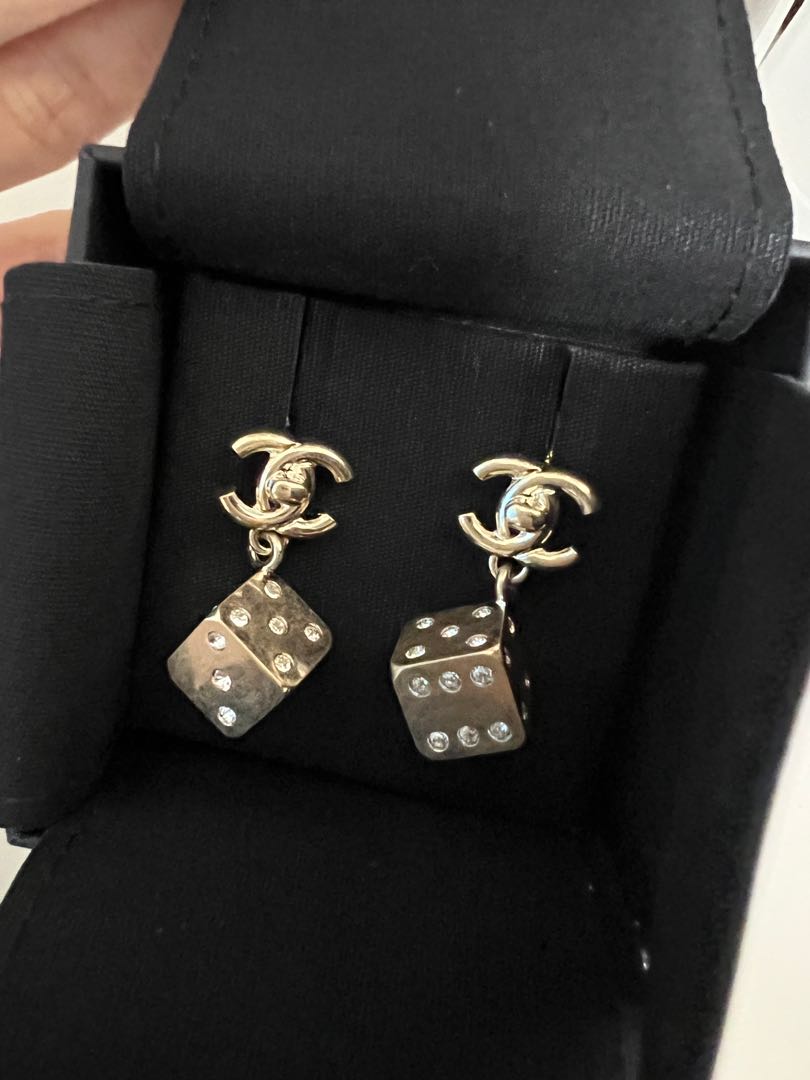 Chanel top dice earrings