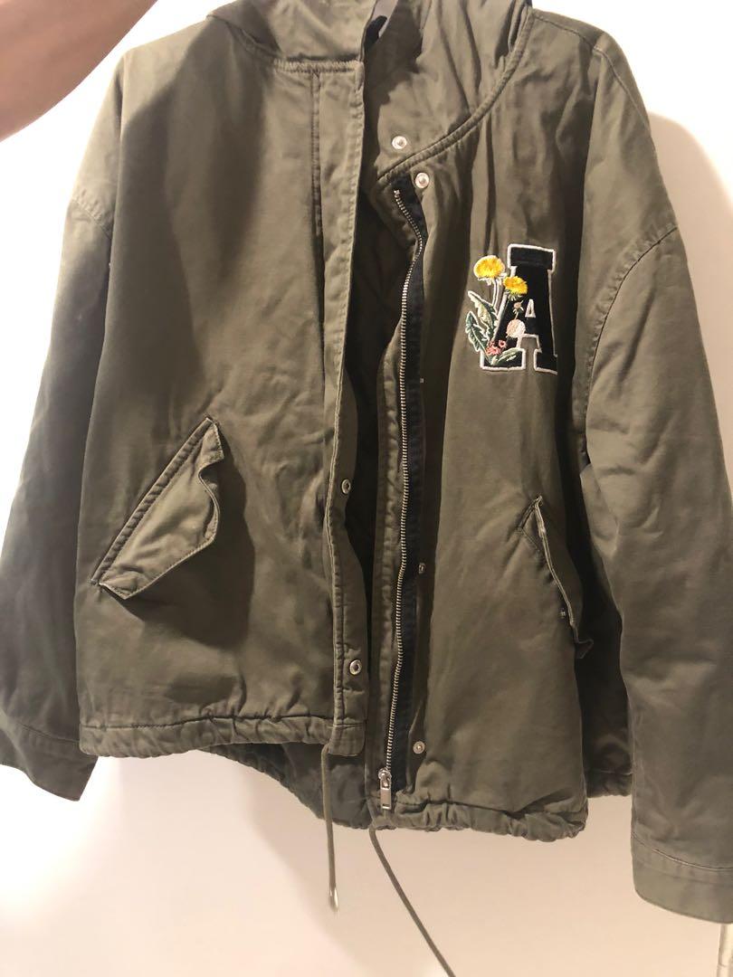 Green jacket (Category: Coats, Jackets and Outerwear) located in Singapore. Submitted by piggyng (Listing ID 1119258021, Image 1). Description: Worn once from Bershka .