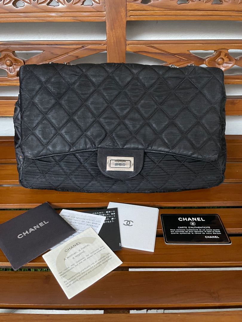 With Chanel 2.55 fabric reissue flap bag black with silver hardware,  Luxury, Bags & Wallets on Carousell