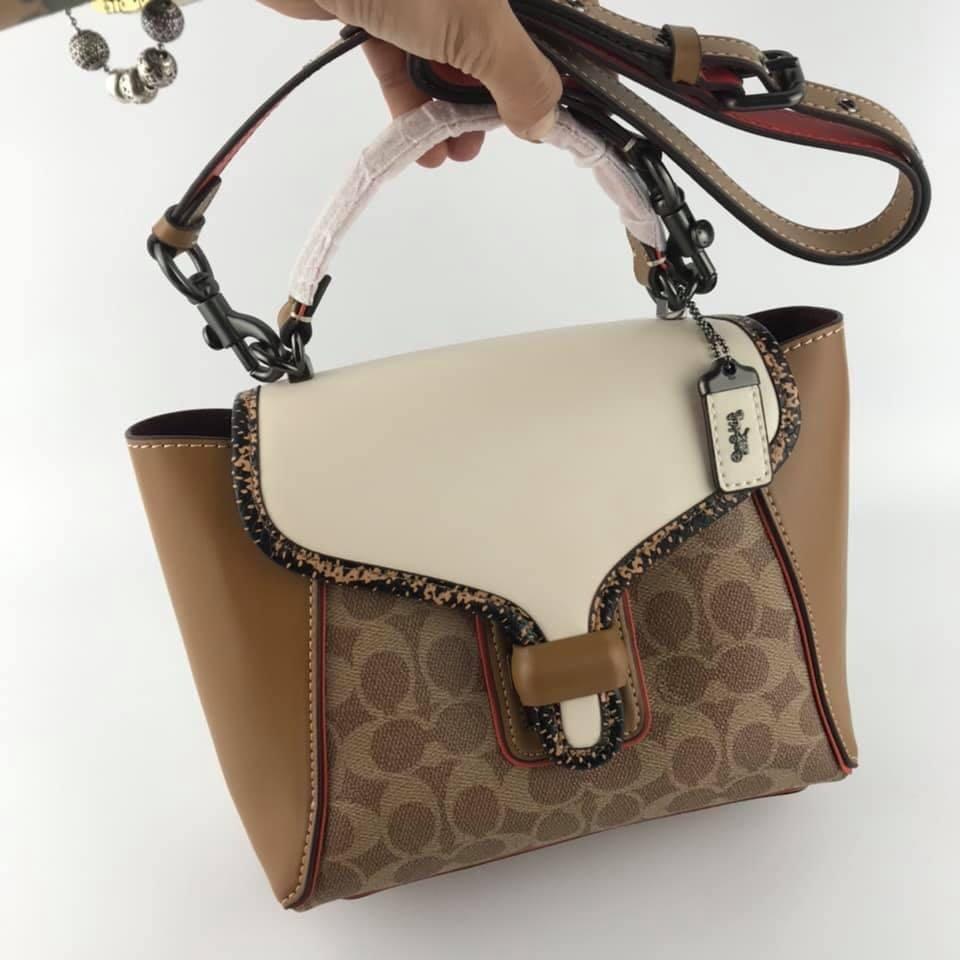 courier carryall 23 in colorblock signature canvas
