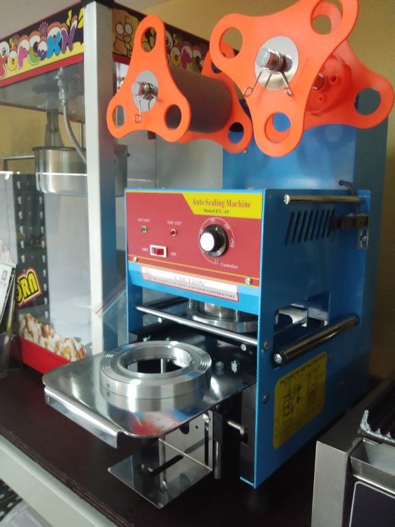 CUP SEALING MACHINES (BRAND NEW) (Category: Other Kitchen Appliances) located in Manila. Submitted by cosmicmachineries (Listing ID 1119475350, Image 3). Description: CUP SEALING MACHINES (BRAND NEW) FOR YOUR MILK TEA, SHAKE, TAHO, SLUSH, JUICE, WATER, OR ANY OTHER DRINK OR FOOD BUSINESS SEMI-AUTOMATIC CUP SEALING IDEAL FOR PAPER AND PLASTIC CUPS MODEL: ET-A9 SIZE: 282 X 360 X 535 MM WEIGHT: 21 KG POWER SUPPLY: 220V / 60HZ / 340W CUP SIZE: 60-65 