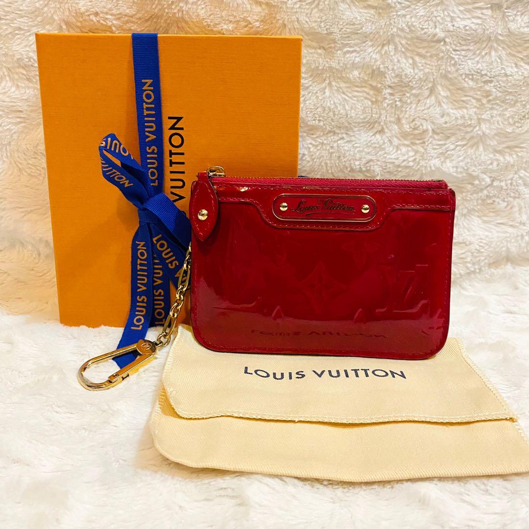 Authentic LV Key Pouch Empreinte Red, Luxury, Bags & Wallets on Carousell