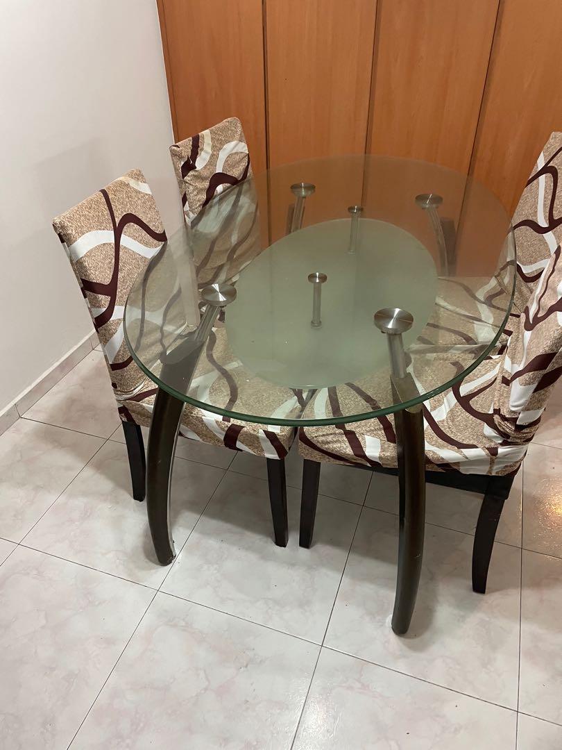 Used glass dining table and 4 chairs Furniture Home Living