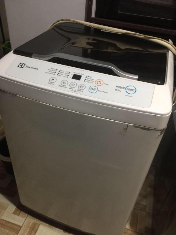 Electrolux Automatic Top Load Washing Machine (Category: Washing Machines and Dryers) located in Quezon City. Submitted by bareminimalistph (Listing ID 1119651663, Image 1). Description: Electrolux Automatic Top Load Washing Machine ▪️Php 3,500 ▪️Model : EWT854XW ▪️Brand : Electrolux ▪️Capacity : 8.5 kg ▪️Measurements:950mm x 580mm x 600mm (H x W x D) ▪️Bought for Php 15,000++ ▪️Condition : Pre-Loved ▪️Issue/s: •Chipped paint in some parts •needs