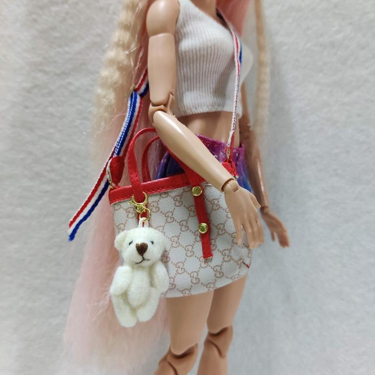 Teddy bear and barbie doll hotsell