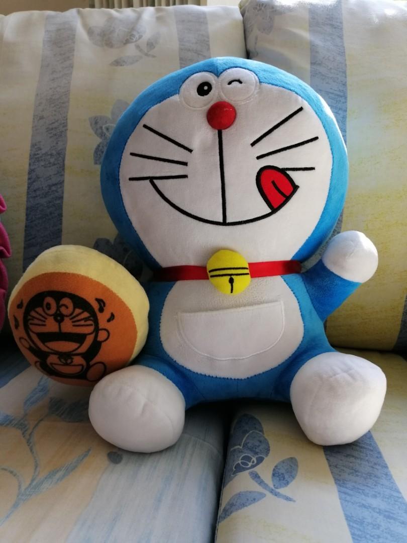 Doraemon (Category: Plushies & Soft Toys) located in Singapore. Submitted by henrychan6788 (Listing ID 1119937421, Image 2). Description: Well kept like new Doraemon plush soft toy Height 32cm Wide 25cm.