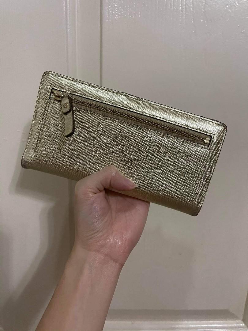 kate spade mikas pond stacy gold (Category: Wallets & Card holders) located in Marikina City. Submitted by ratbulaga (Listing ID 1119855533, Image 2). Description: For sale only P2,300 kate spade mikas pond stacy gold used Location: antipolo city Meet ups: sm masinag, robinsons metroeast, sm marikina, lrt santolan or gateway cubao Contact number 0 9 1 7 8 6 6 0 2 9 6.