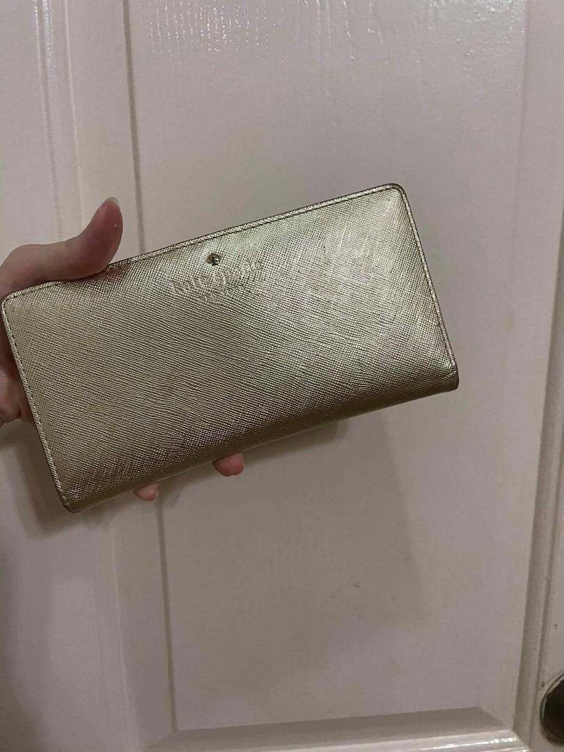 kate spade mikas pond stacy gold (Category: Wallets & Card holders) located in Marikina City. Submitted by ratbulaga (Listing ID 1119855533, Image 1). Description: For sale only P2,300 kate spade mikas pond stacy gold used Location: antipolo city Meet ups: sm masinag, robinsons metroeast, sm marikina, lrt santolan or gateway cubao Contact number 0 9 1 7 8 6 6 0 2 9 6.