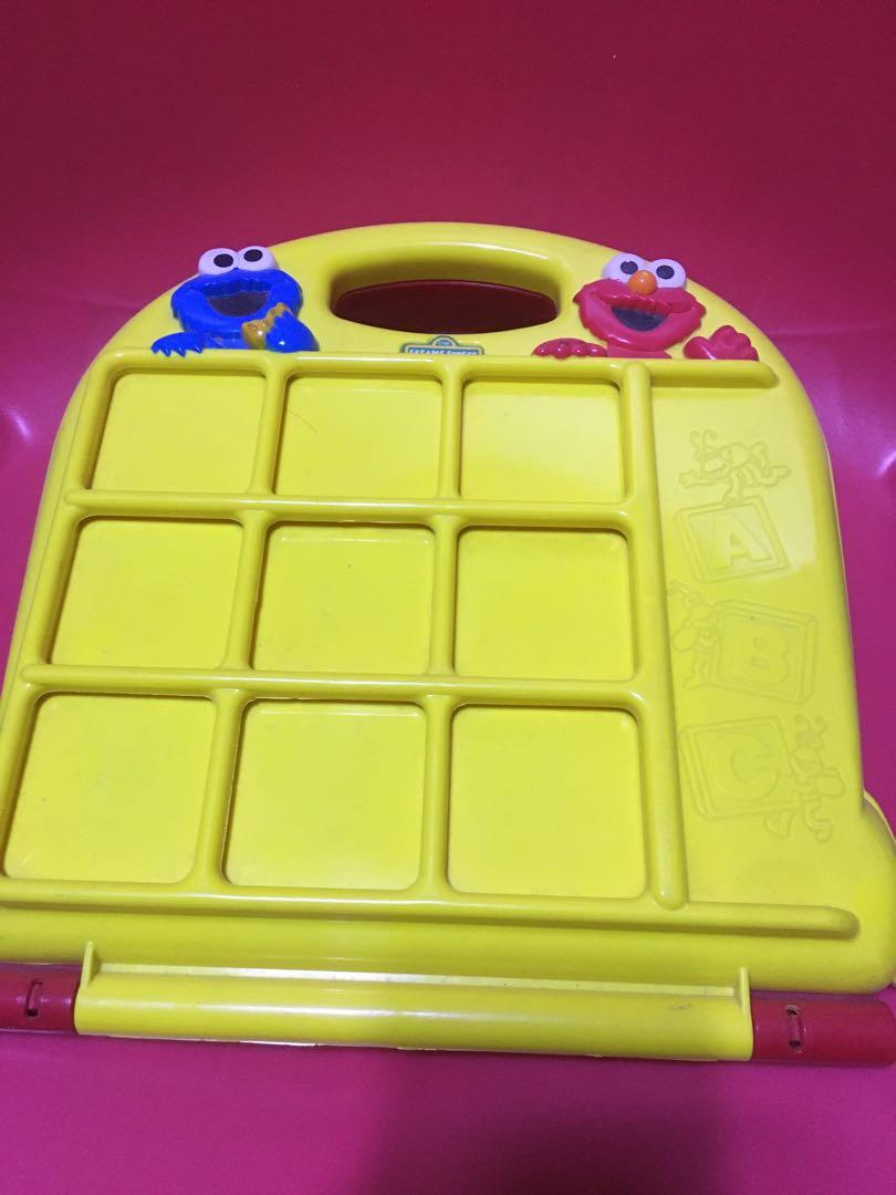 Sesame street educational toy (Category: Educational & Learning Toys) located in Pasig City. Submitted by ramscleanup (Listing ID 1119896589, Image 1). Description: 24 pcs square thingies (letters and numbers… back to back) Take along toy .