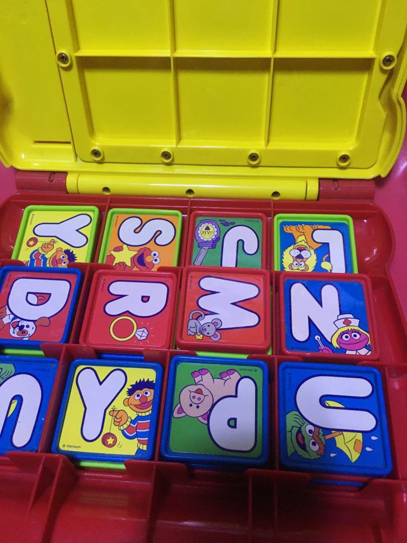 Sesame street educational toy (Category: Educational & Learning Toys) located in Pasig City. Submitted by ramscleanup (Listing ID 1119896589, Image 3). Description: 24 pcs square thingies (letters and numbers… back to back) Take along toy .