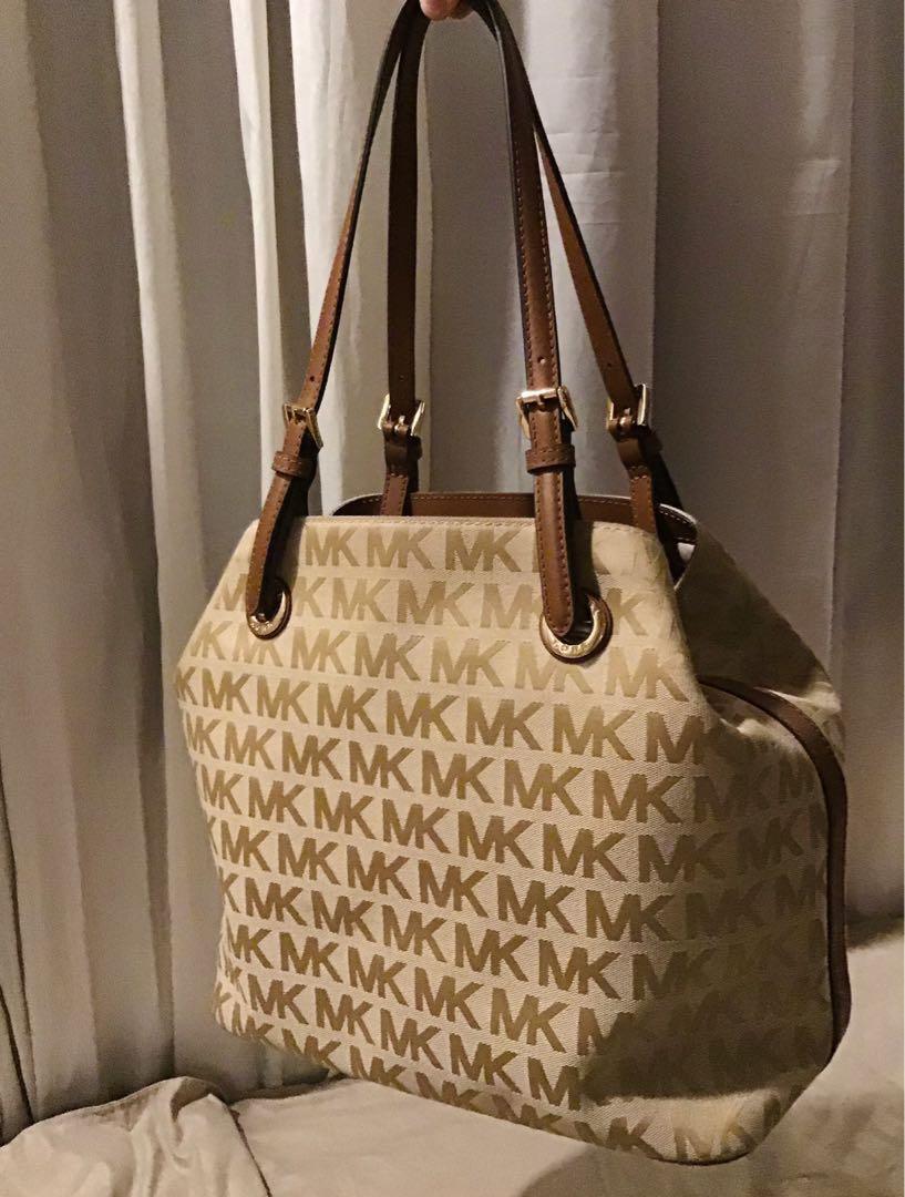 100 Authentic Michael Kors jet set grab bag Luxury Bags Wallets on Carousell