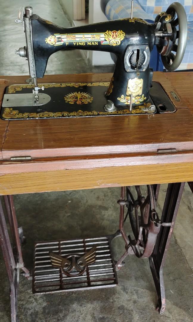 The antique vintage collectible flying man sewing machine, Hobbies