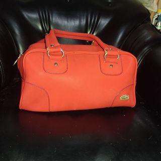Red Lacoste bag