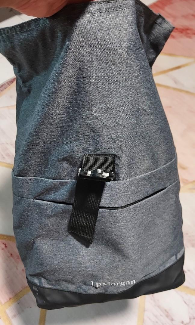 Backpack (Category: Backpacks) located in Singapore. Submitted by nandyp (Listing ID 1120560067, Image 5). Description: JP Morgan backpack, top zip closure, fold over with buckle closure for added security. Inside there is a pocket for laptops. in front there is a zipped compartment. Cleaning house. never used this bag before. in mint condition. no marking whatsoever on it. 50cm length (once top is folded and buckled), 36cm width approx. no nego.