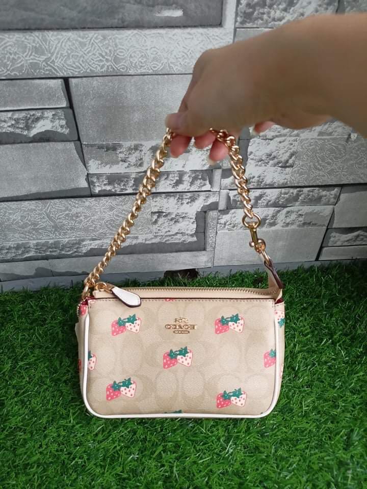 Coach pochette, Luxury, Bags & Wallets on Carousell