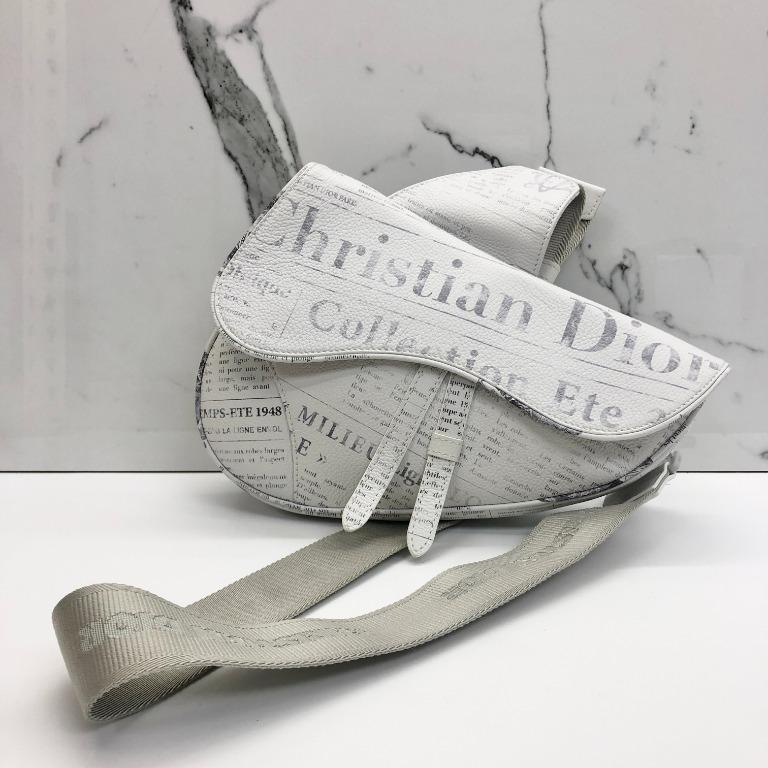 Dior store saddle newspaper