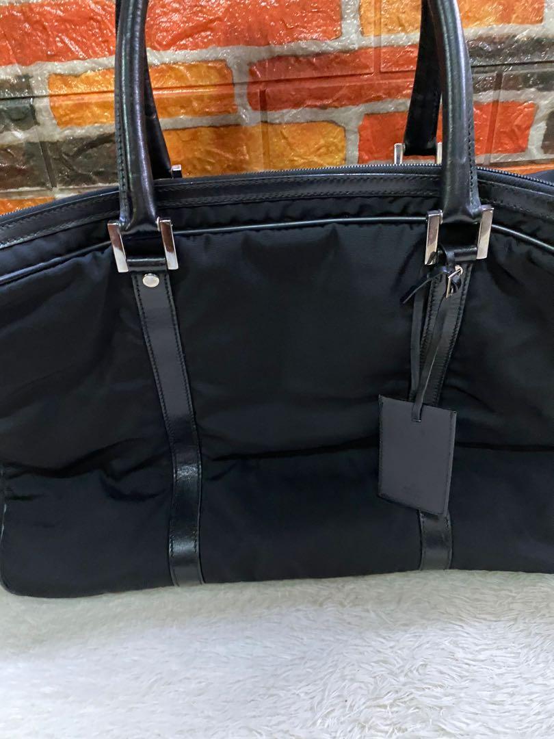 Authentic Gucci Travel Bag (Category: Luxury Bags & Wallets) located in Cagayan de Oro. Submitted by riggstuffs (Listing ID 1120497640, Image 3). Description: Preloved bag from Japan Guaranteed authentic Material is made of nylon canvas with leather trimming In very good condition DISCLAIMER: Riggstuffs is not affiliated or associated with any brand posted. All trademarks and copyrights belong solely to the original brand owner(s)..
