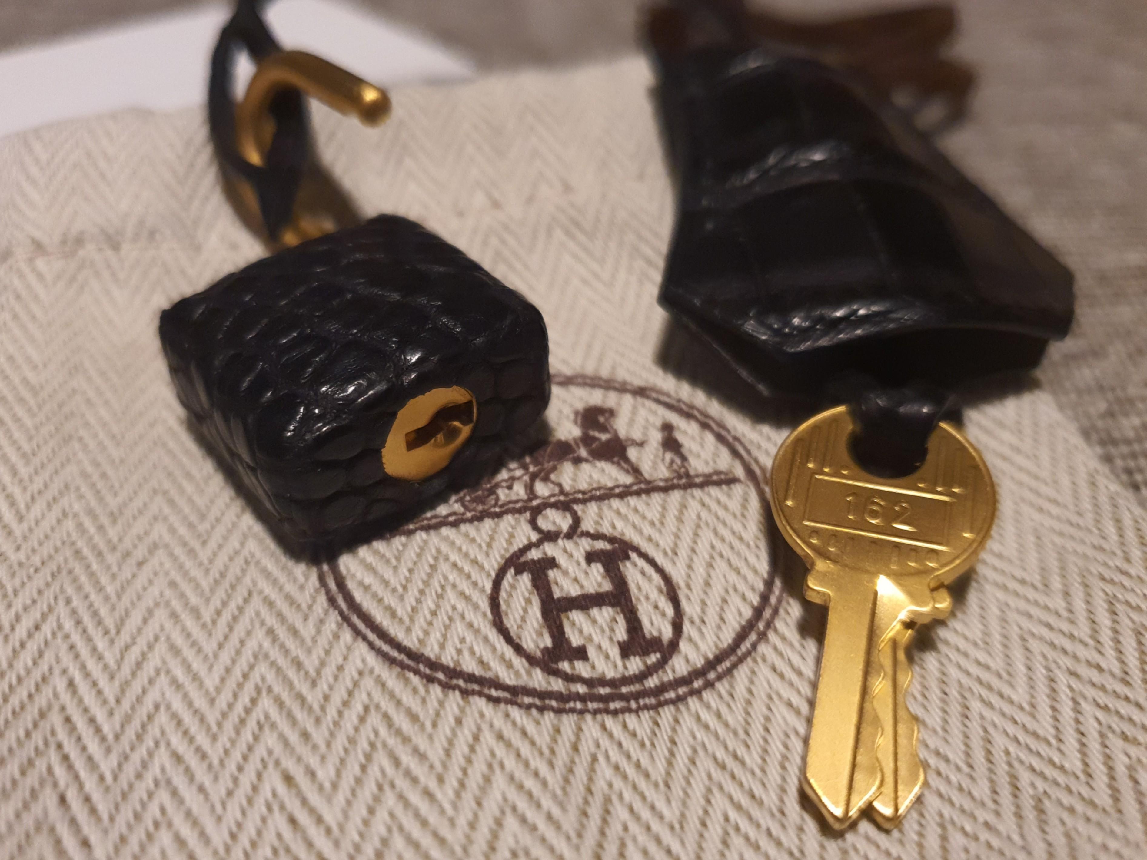 Hermes Gold Cadena Lock Key Set with gold-tone hardware and turn lock  closure at 1stDibs