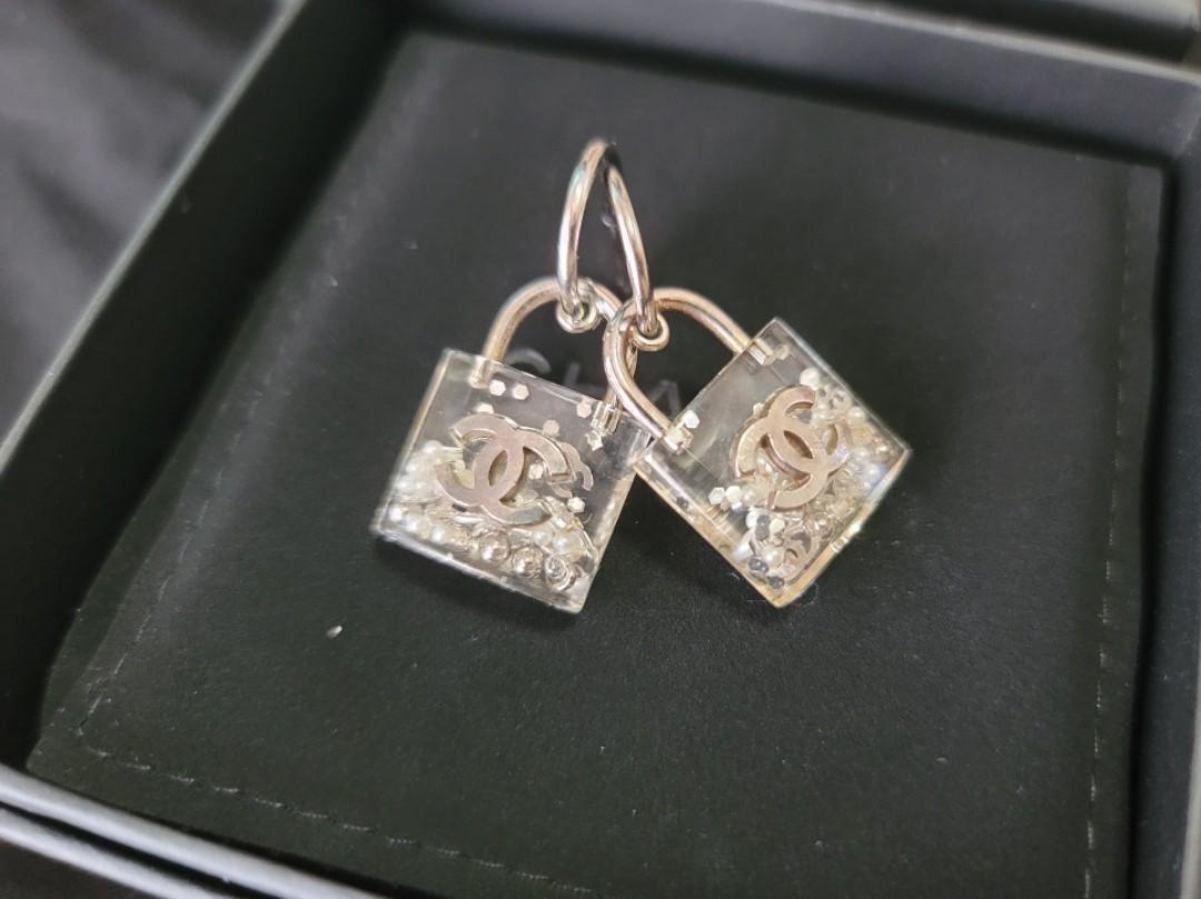 CHANEL lock earrings Carousell