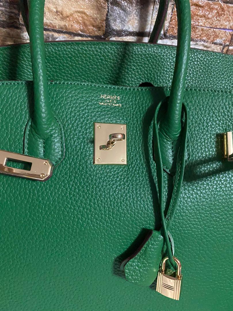 Green bag 35 cm genuine leather (Category: Luxury Bags & Wallets) located in Paranaque City. Submitted by love1927 (Listing ID 1117168949, Image 3). Description: Up for grabs is my green genuine leather bag, use once on fashion show & photoshoot RiRi zipper underneath on pocket compartment This bag is much beautiful in actual Kindly check all the pictures you see is what you get I got this as gift from my Foreign friend from Ireland Coded much be
