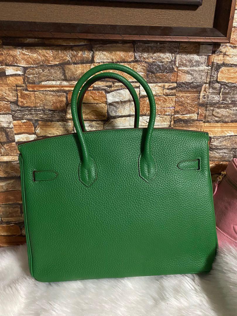 Green bag 35 cm genuine leather (Category: Luxury Bags & Wallets) located in Paranaque City. Submitted by love1927 (Listing ID 1117168949, Image 2). Description: Up for grabs is my green genuine leather bag, use once on fashion show & photoshoot RiRi zipper underneath on pocket compartment This bag is much beautiful in actual Kindly check all the pictures you see is what you get I got this as gift from my Foreign friend from Ireland Coded much be