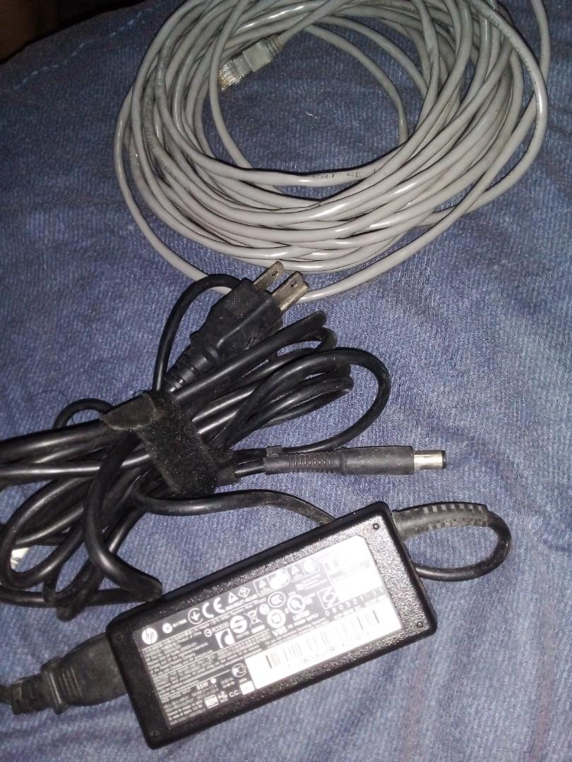 HP laptop charger (Category: Chargers) located in Pasig City. Submitted by jomavi20 (Listing ID 1117083923, Image 2). Description: 💯original very good used condition free 10M LAN cable.