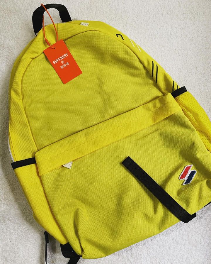 superdry yellow backpack