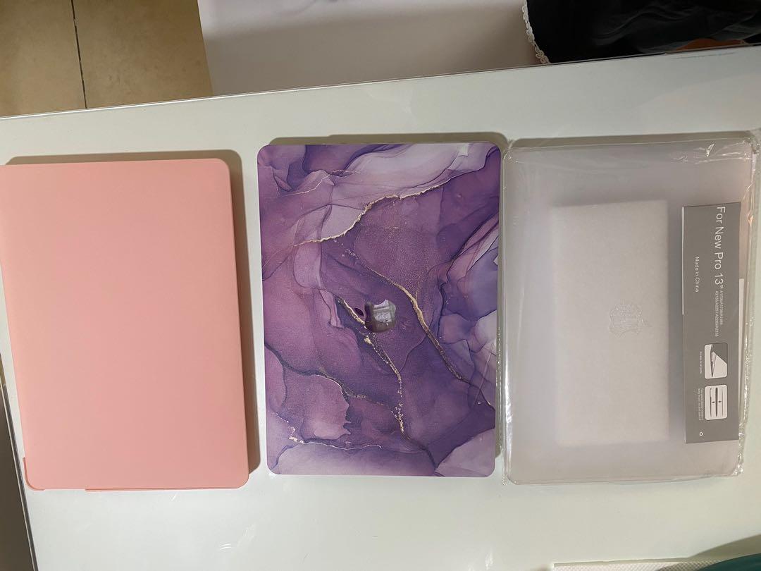 3pcs MACBOOK PRO 13” HARD CASE (Category: Cases & Sleeves) located in Quezon City. Submitted by __decluttering (Listing ID 1120636593, Image 1). Description: Bought for 700 each. Only used once. Nilagay lang para icheck kung sakto fitting All with keyboard protector With FREE SCREEN PROTECTOR Php 600 purple marble design Php 400 pink matte case Php 400 clear matte case Take All for 1k only.