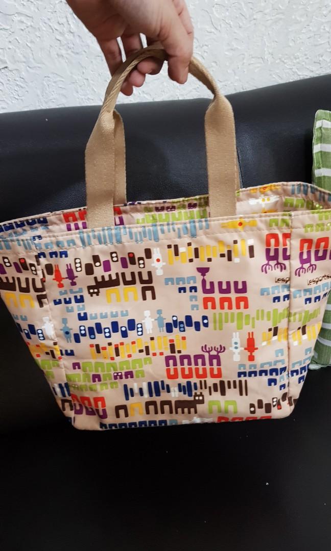 Authentic Le sportsac (Category: Purses & Pouches) located in Antipolo. Submitted by cluttercleanup (Listing ID 1120655447, Image 1). Description: comes with small pouch no flaws.