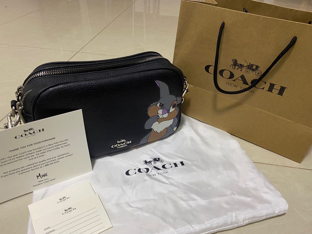 coach x disney sling bag