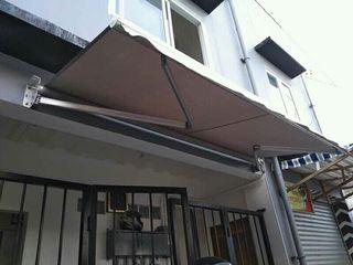 CUSTOMIZED RETRACTABLE AWNING/CANOPY