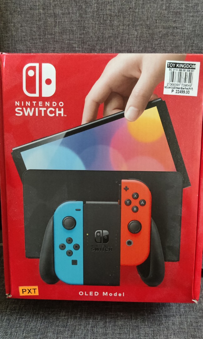 NINTENDO SWITCH OLED MODEL COLOR NEON ALMOST BRAND NEW WITH LOTS