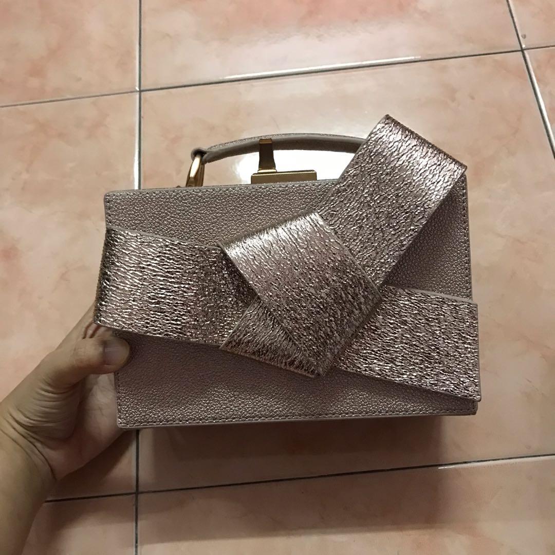Metallic ribbon top handle sales bag