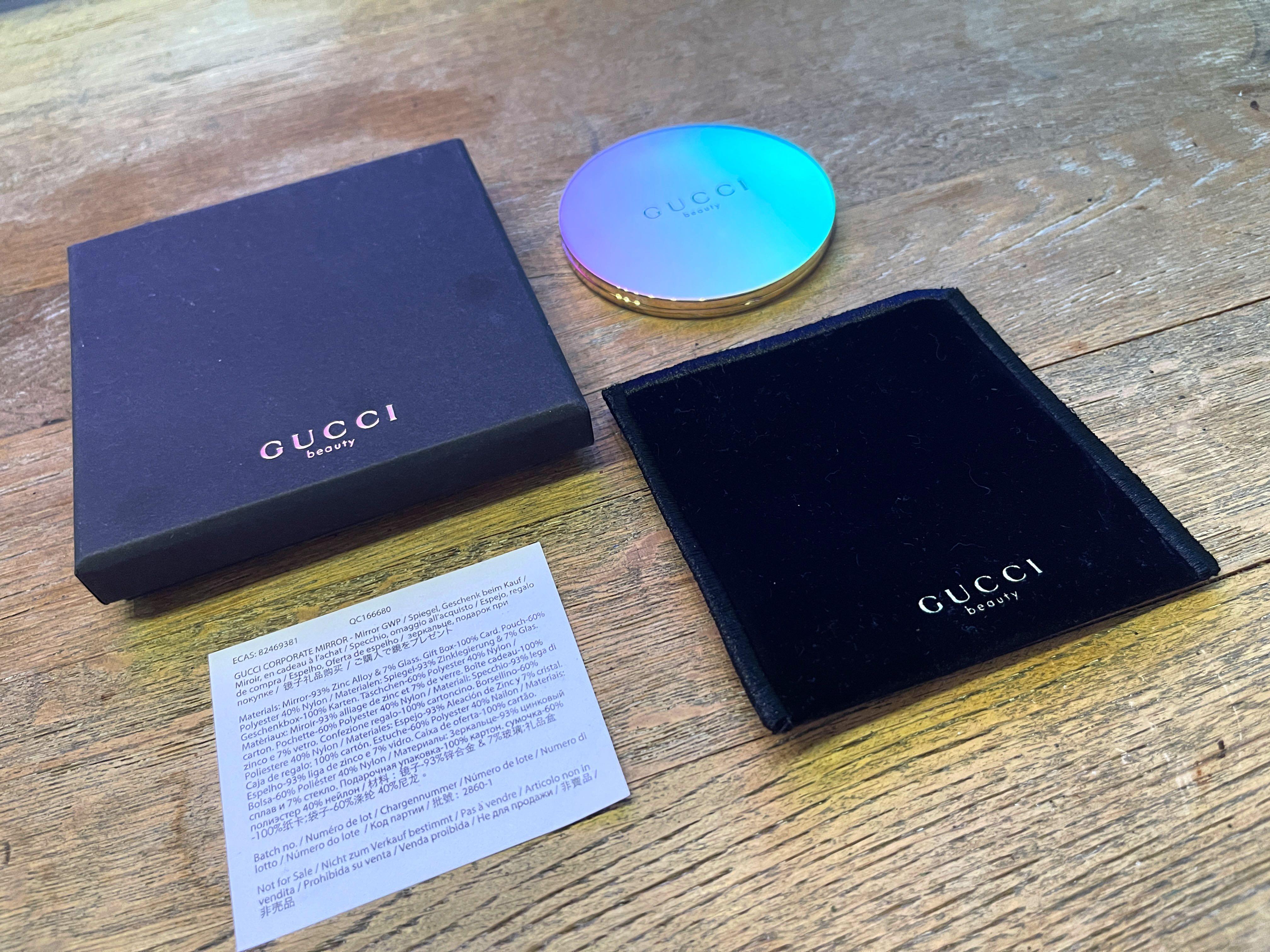 Promotional compact mirror as a GWP by Gucci