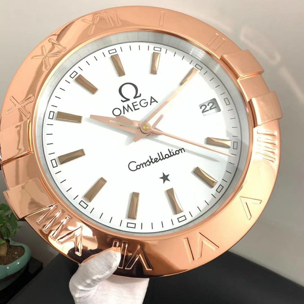 Omega clock wall store
