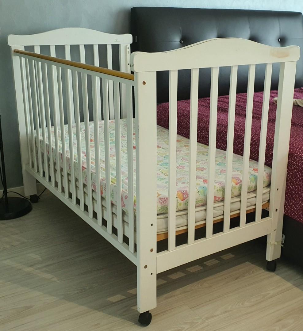 Preloved BABYLOVE Extra Large Meranti Wood Convertible Baby Cot with mattress bed sheet
