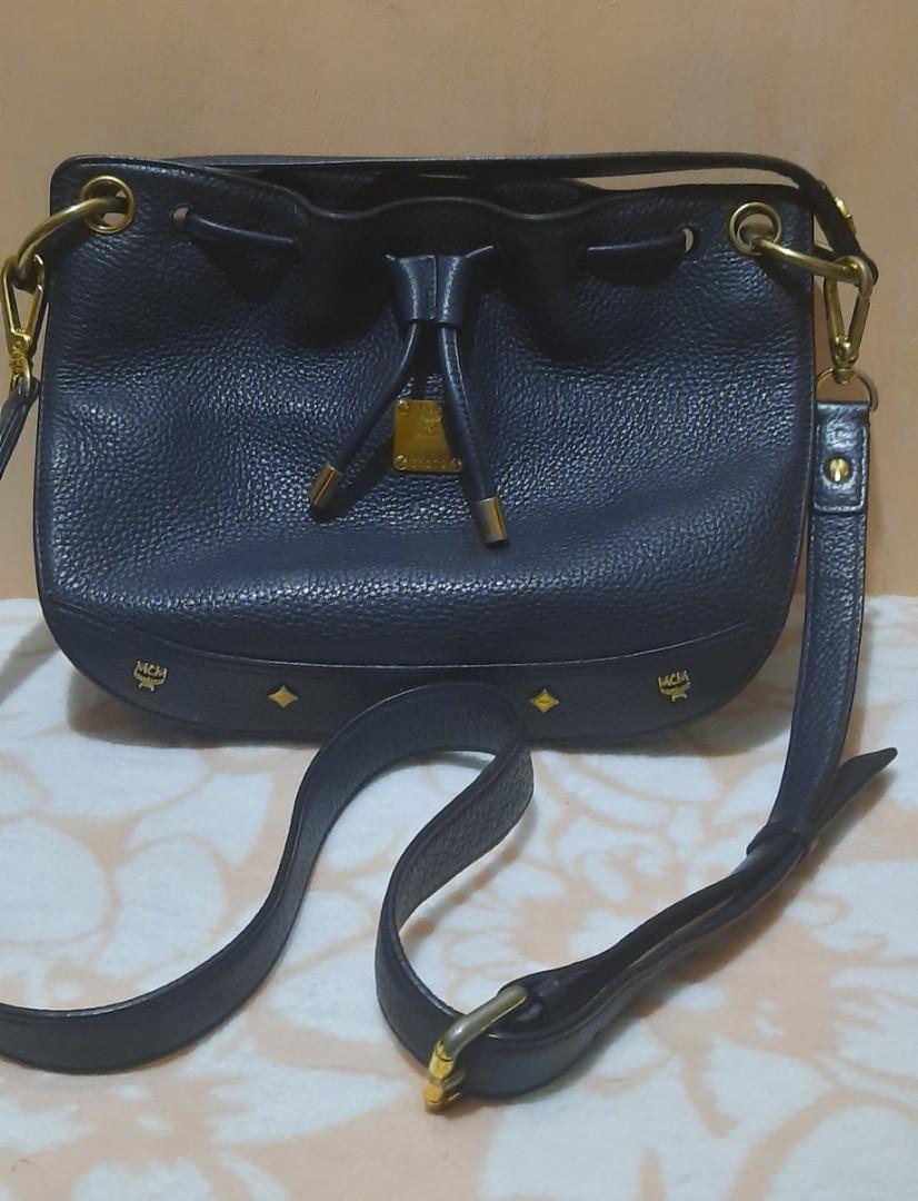 MCM Germany 2 way small bucket bag (Category: Luxury Bags & Wallets) located in Paranaque City. Submitted by bluedolphin1911 (Listing ID 1121000175, Image 1). Description: Preloved MCM from Korea Turnable screw with etekita hologram Authentic MCM Germany.