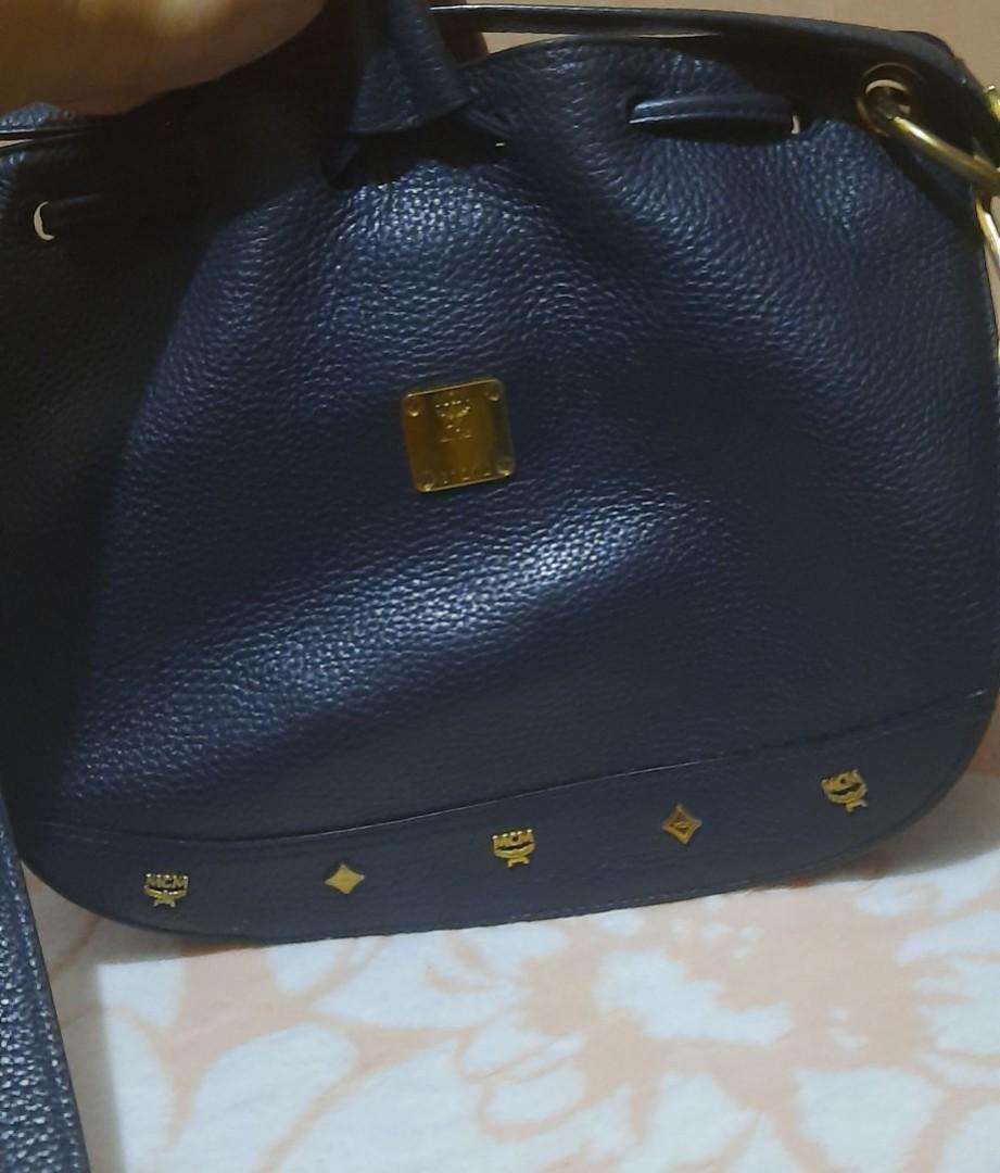 MCM Germany 2 way small bucket bag (Category: Luxury Bags & Wallets) located in Paranaque City. Submitted by bluedolphin1911 (Listing ID 1121000175, Image 2). Description: Preloved MCM from Korea Turnable screw with etekita hologram Authentic MCM Germany.