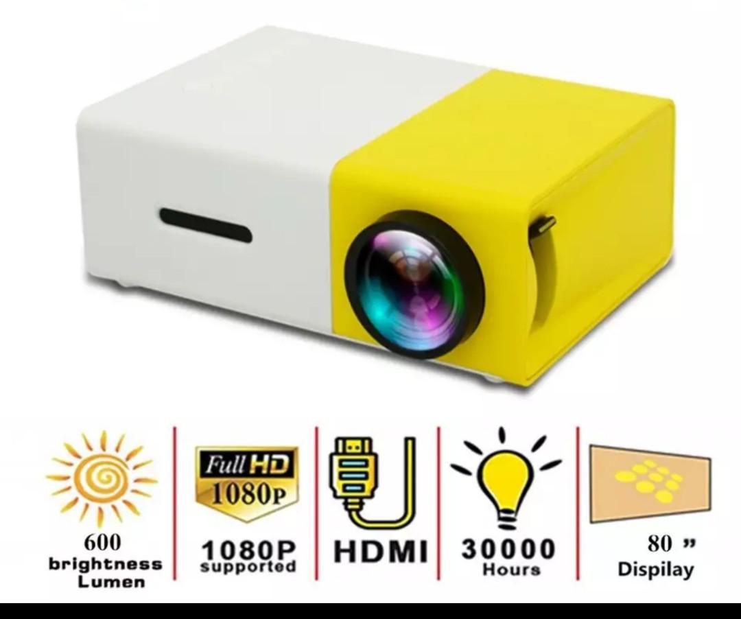 Mini projector (Category: Projectors) located in Singapore. Submitted by irrelevant_ (Listing ID 1121348556, Image 1). Description: Check photos for specification Slightly Negotiable self collect at 532377.