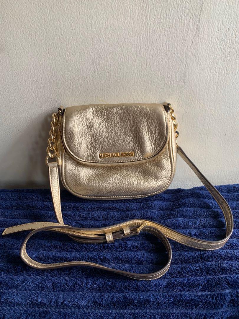 Michael kors gold sling bag hotsell