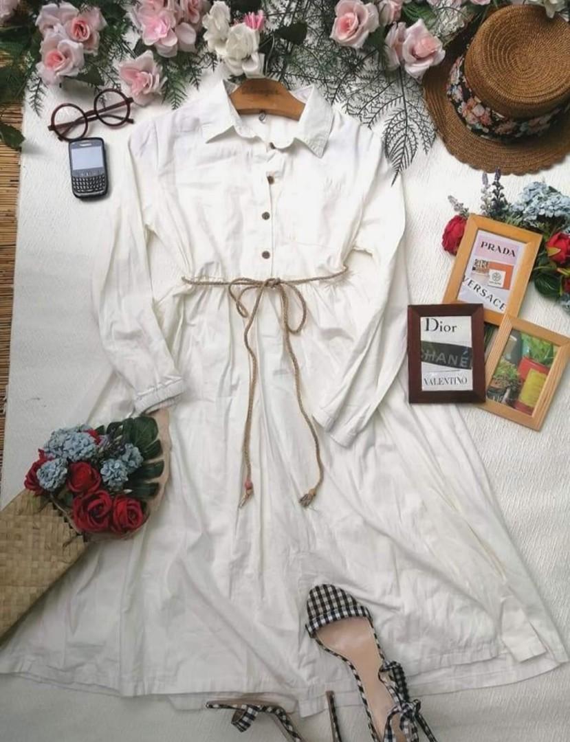 Plus size white button down dress (Category: Dresses) located in Caloocan City. Submitted by decluterrer_ (Listing ID 1121337173, Image 1). Description: WHITE BUTTON DOWN DRESS SIZE: L-XL Condition: 10/10 Like new / No flaws Price: P119.00 String belt not included, used as photo accessory only..