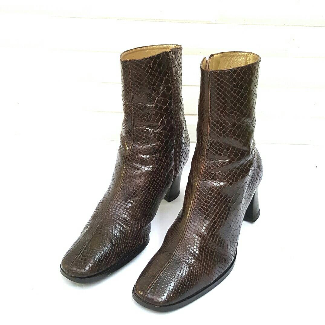 Saint laurent 2025 snakeskin boots
