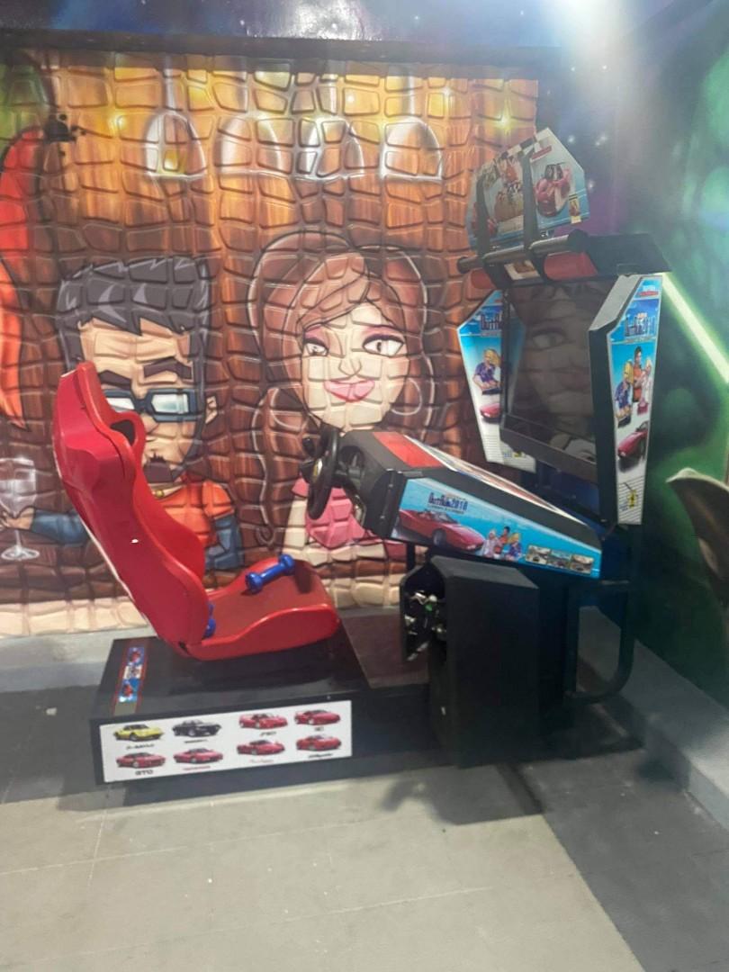 Arcade machine (Category: Controllers) located in San Juan City. Submitted by frugalmomph (Listing ID 1121515079, Image 2). Description: Outrun Driving Arcade Machine. seldom used.