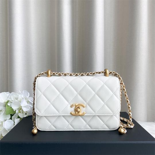 small white chanel purse black