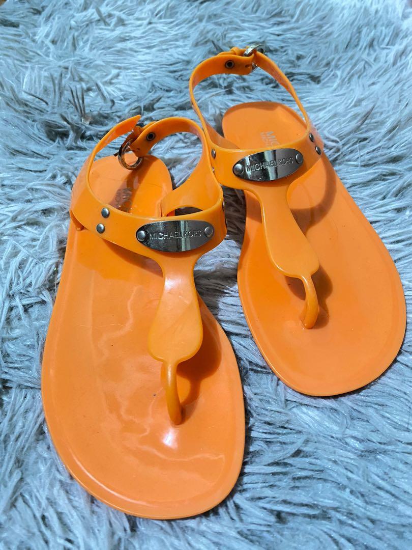Michael Kors Orange Jelly Plate Sandals, Luxury, Sneakers & Footwear on  Carousell