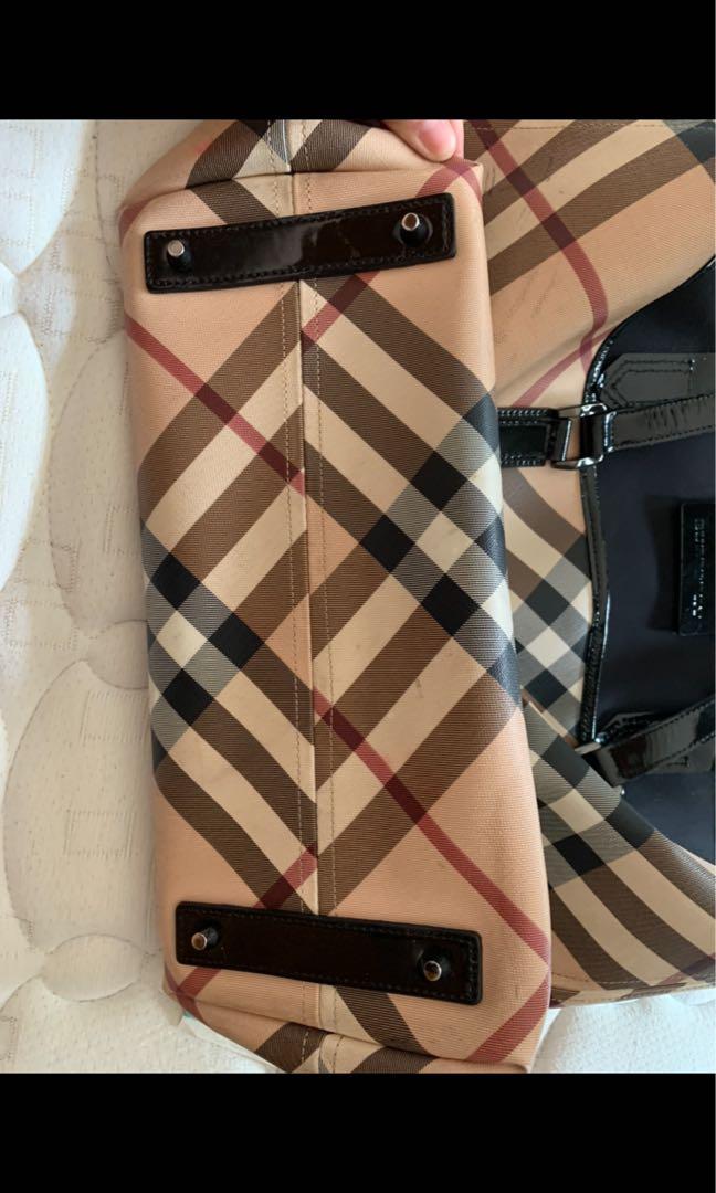 Preloved burberry bag authentic burberry bag (Category: Luxury Bags & Wallets) located in Manila. Submitted by christinevg (Listing ID 1121488073, Image 2). Description: Authentic burberry bag. With stain. Without box, paper bag and dust bag. Php 6,000 only. Last price. .