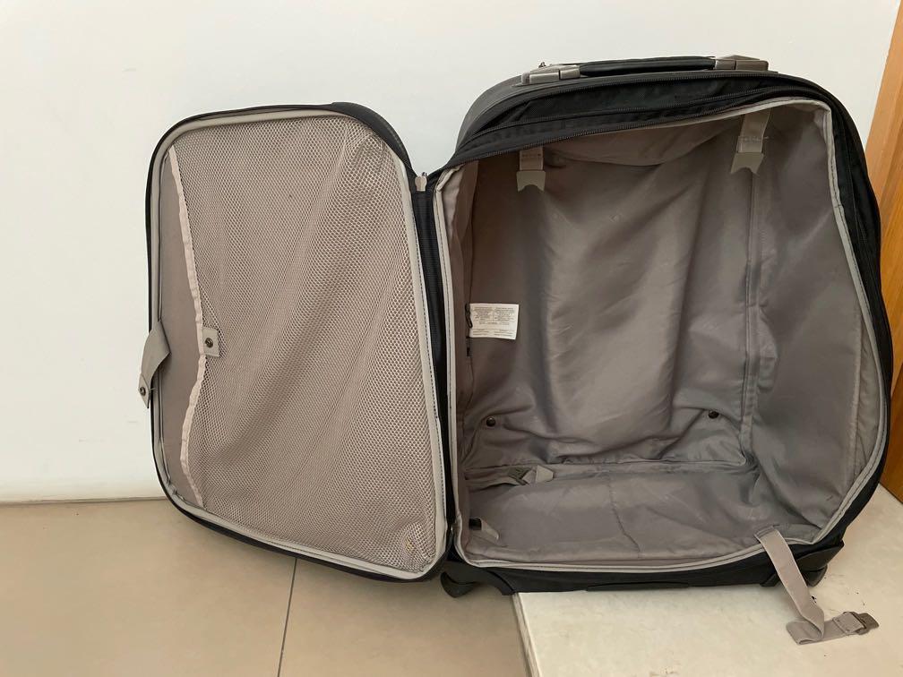Damaged samsonite luggage top
