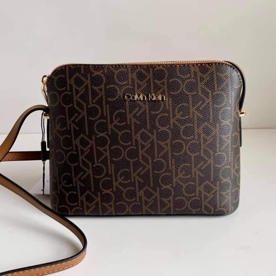 NEW! CALVIN KLEIN CK BROWN RED DOUBLE ZIP CROSSBODY SLING BAG PURSE $148  SALE, Women's Fashion, Bags & Wallets, Cross-body Bags on Carousell